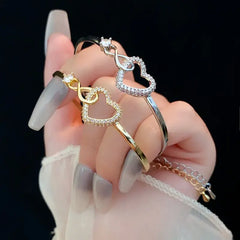 | Heartstrings Bracelet| Love Link Hollow Bracelet| Eternal Embrace Band| Whisper of Love Bracelet| Love scape Hollow Heart Bangle| Tender Loop Bracelet| Hollow Heart Harmony| Delicate Bond Bracelet| Amor Hollow Charm| Sweetheart Silhouette Bracelet|